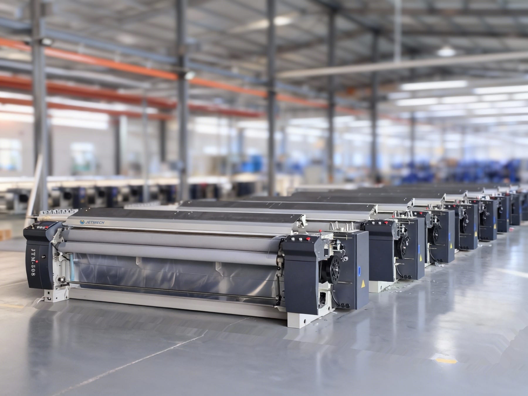 JETMECH JTM508 water jet loom in a textile weaving workshop